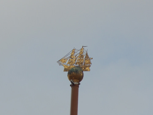 The symbol at the top of the stock exchange pole.