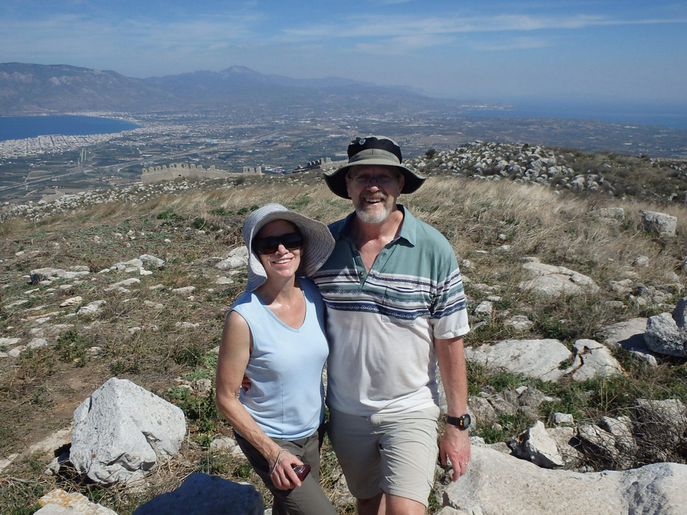 Dennis and Terry Struck standing at the Temple to Aphrodite in Acrocorinth (aka Akrokorinth), Greece.