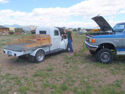 Bonnie's husband helps us start our truck.