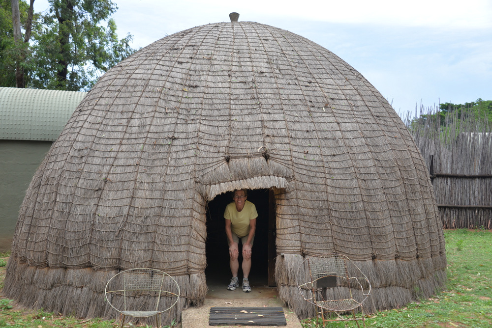 That is Terry and our Home for the Night. It is called a Beehive Hut.