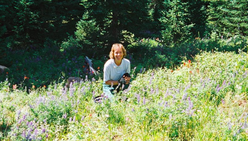 Terry in a field of flowers.