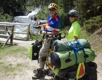 GDMBR: Dennis & Terry Struck and the Bee at the Spray River Crossing.