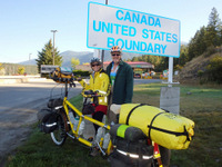 GDMBR: Terry and Dennis Struck and the Bee on the other side of the Roosville Border Station back in September of 2014.