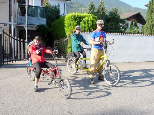 Ray F on the recumbent; Dennis and Terry Struck on the tandem.