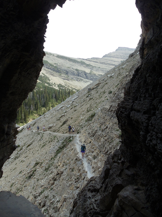 A back-view of the ledge with some hikers.