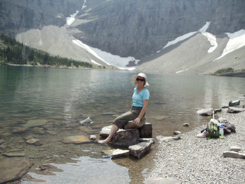 Terry Struck, dipping her toes in Crypt Lake (Waterton Lakes National Park, Alberta, Canada; 31 July 2018).
