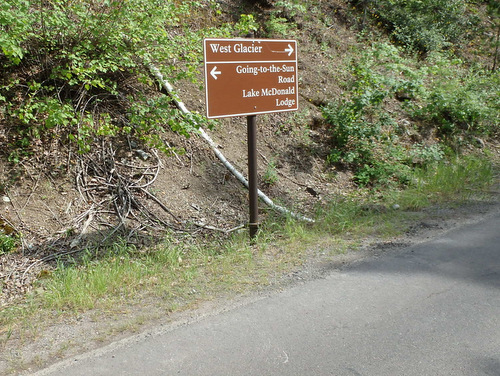 We're turning left (east) onto Going to the Sun Road, now heading for Lake McDonald Lodge.