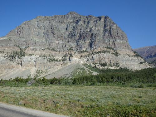 Cycling out of Many Glaciers Lodge, Glacier NP.