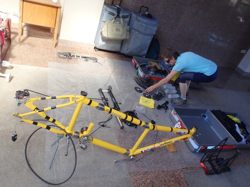 We lay out our bike components on a plastic sheet.