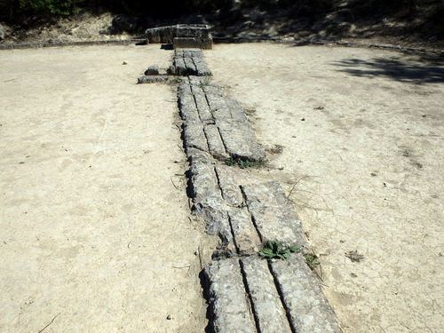 The Starting Line, a runner's toe had to be placed in each groove.