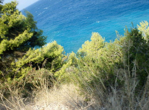 Cycling the Gulf of Corinth's coast.