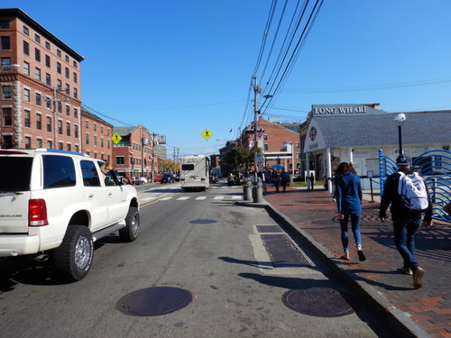 Cycling northeast along Portland's Commercial Street.