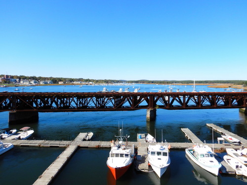 Merrimack River boat docks viewed from the bridge on US-1 in Newburyport, MA.