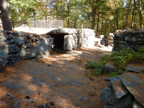 Man made stone laid ground structure.