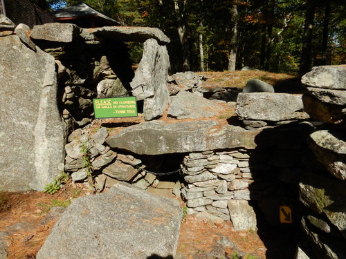 Man made stone laid ground structure.