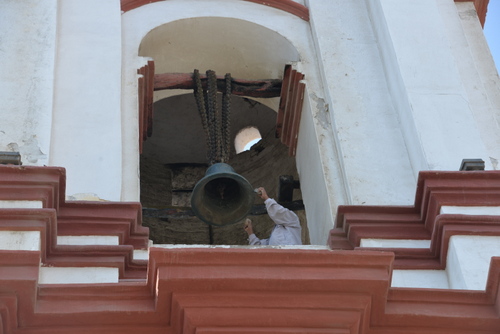 It has become an honor and a tradition to ring the bell for the church using rocks.