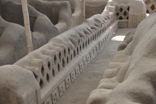 Two distinct boundary walls, perhaps structural at one time.