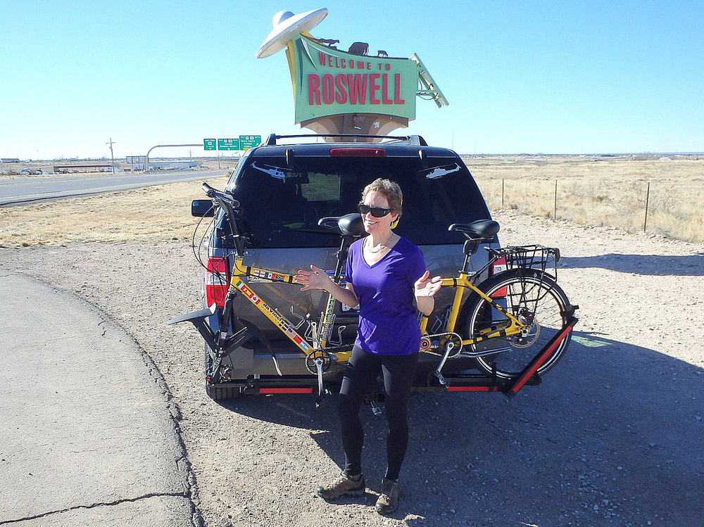 Terry, Dennis (behind the camera) and a the Bee are at the Roswell, New Mexico, Welcome Sign.