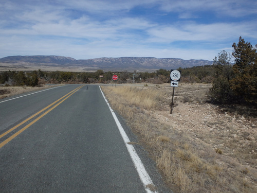 Sharp turn coming, Capitan Mountain Range ahead.