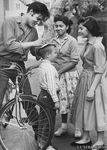 Elvis Presley on his Bicycle